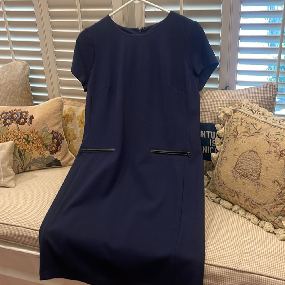 A Classic Dress with leather trimmed pockets!